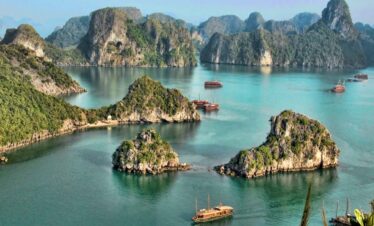 Scenic view of limestone islands and turquoise waters in a tropical bay.