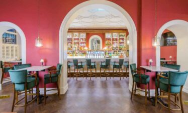 Stylish lounge bar with colourful decor and comfortable seating.