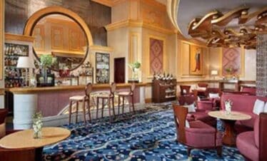 Luxury hotel lounge with elegant decor and comfortable seating.
