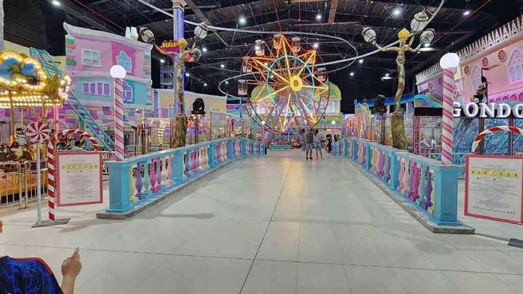Vibrant indoor amusement park with rides and attractions for all ages. Perfect for family fun and en.