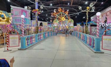 Vibrant indoor amusement park with rides and attractions for all ages. Perfect for family fun and en.