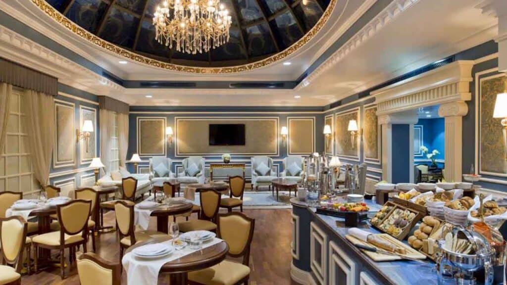 Elegant hotel dining room with luxurious decor and ambient lighting for a refined experience.