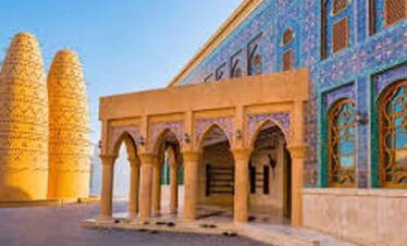 Beautiful view of Dubai's historic architecture with intricate tile work and traditional design elem.