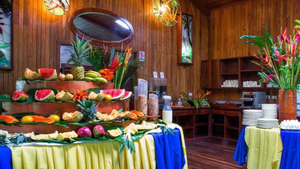 Vibrant fruit buffet display at Travel Buddies Holidays resort.