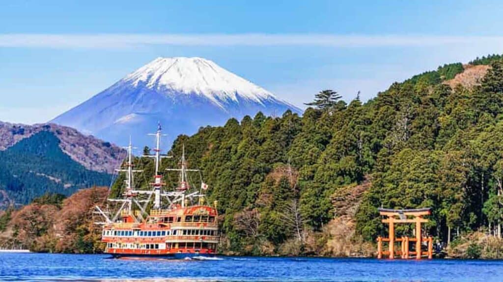 Mount Fuji and Lake Ashi with a cruise ship, Japan.
