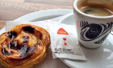 Fresh coffee and pastry at Travel Buddies Holidays café.