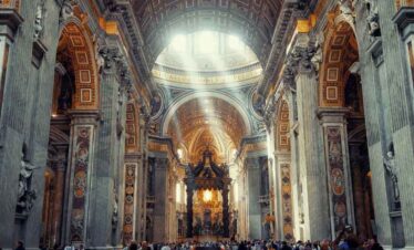 Stunning view of the grand interior of St. Peter's Basilica in Vatican City.