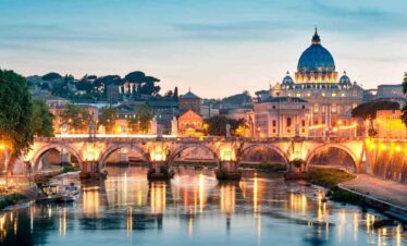 Beautiful view of Rome with the Vatican and river at sunset.