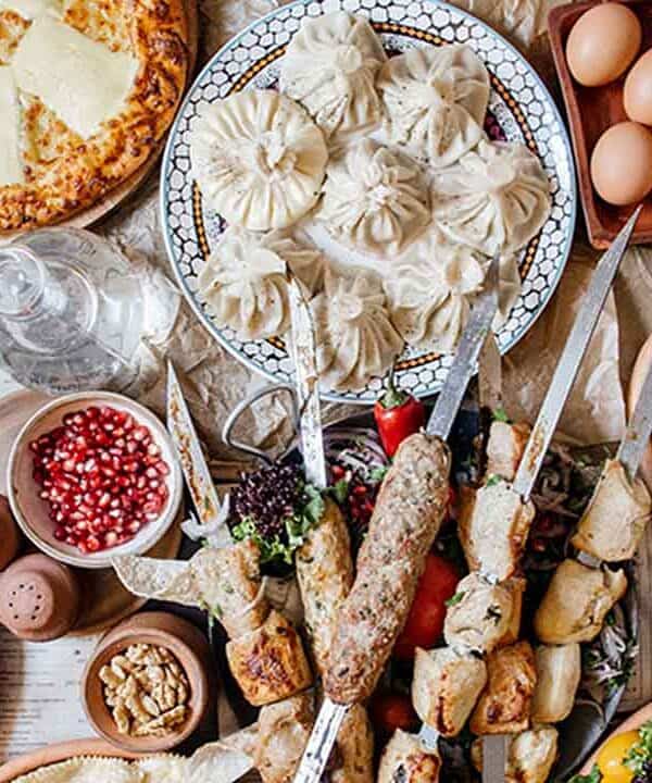 Authentic Georgian Khachapuri with cheese, eggs, and fresh ingredients.