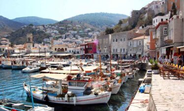 Harbour view with boats and seaside townscape, perfect for holiday relaxation.
