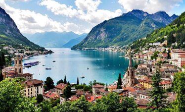 Scenic view of Lake Como with mountains and town in Italy.